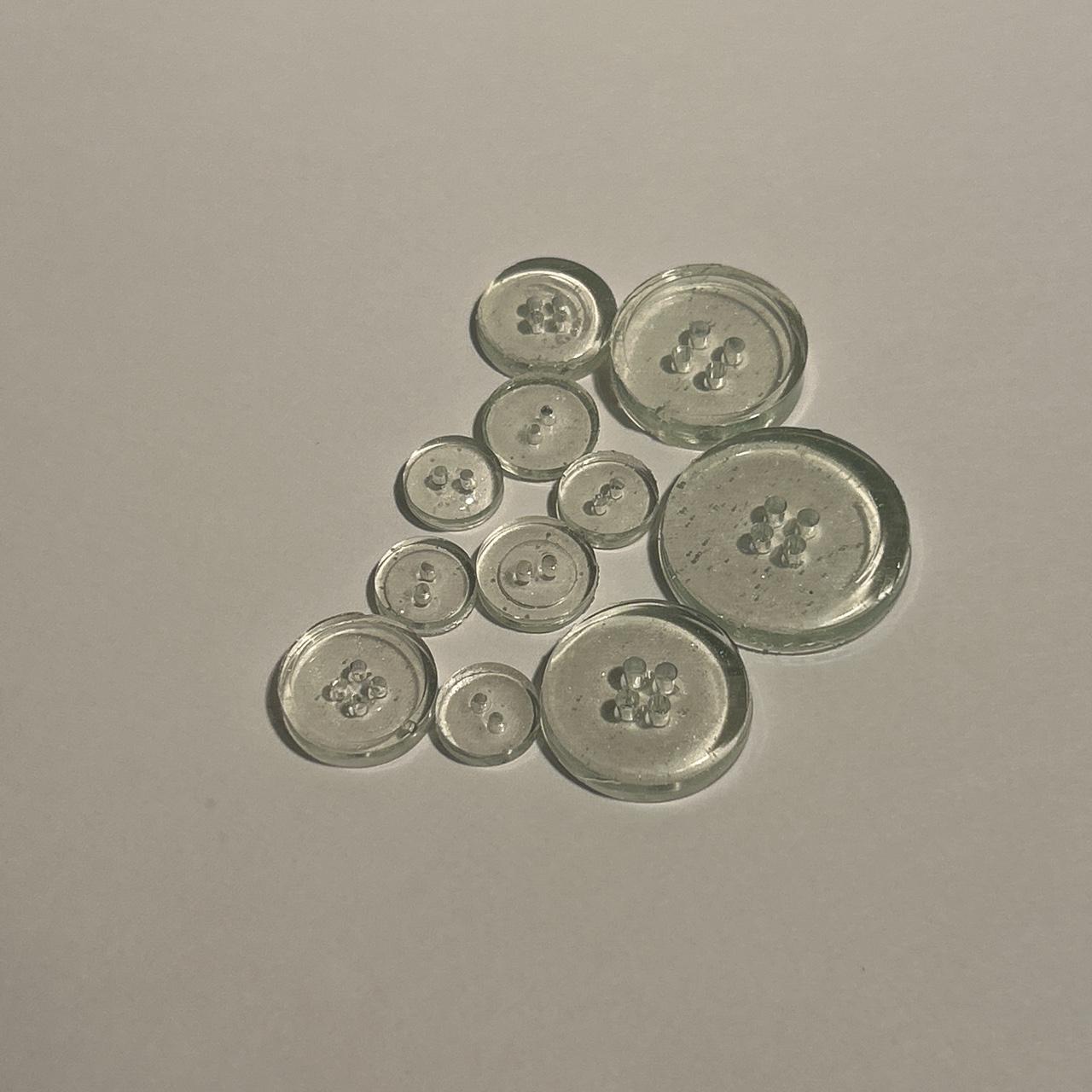 Light green clothing and craft buttons